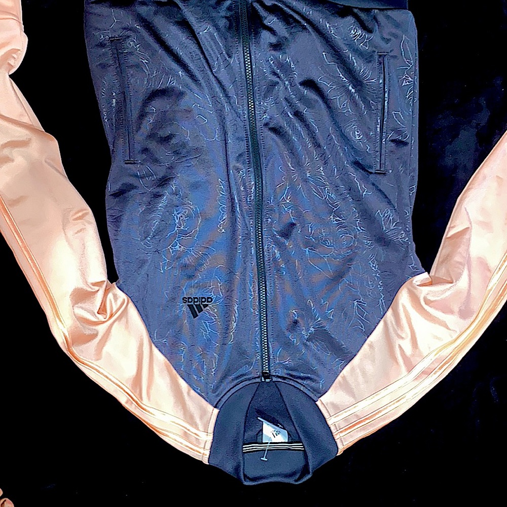 Adidas limited edition jacket with peach sleeves